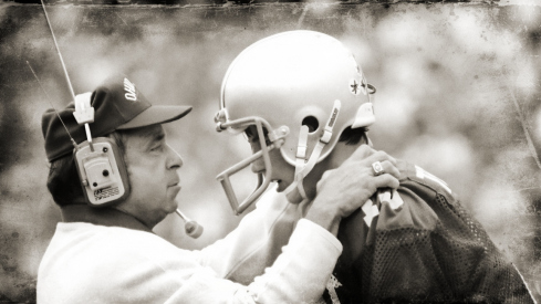 Nov, 1980; Columbus, OH, USA; FILE PHOTO; Ohio State Buckeyes quarterback Art Schlichter and head coach Earl Bruce on the sidelines at Ohio Stadium. Mandatory Credit: Malcolm Emmons-USA TODAY Spor