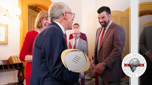 Mike DeWine and Ryan Day shaking hands
