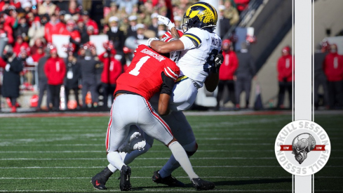 Ohio State cornerback Davison Igbinosun tackling Michigan wide receiver Tyler Morris in 2024