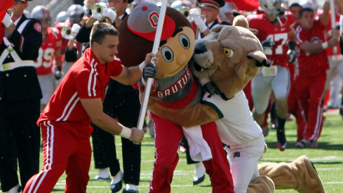 Rufus tackling Brutus before Ohio State’s 2010 game vs. Ohio