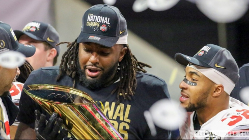 Donovan Jackson and TreVeyon Henderson celebrating the national championship