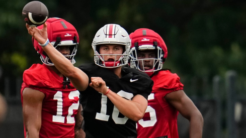 Julian Sayin throwing at preseason camp