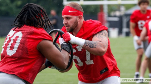 Austin Siereveld in a practice drill vs. Phillip Daniels