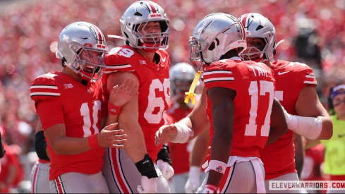 The Buckeyes celebrating Carnell Tate’s touchdown catch