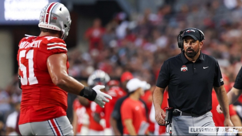 Ryan Day talking to Luke Montgomery after a play
