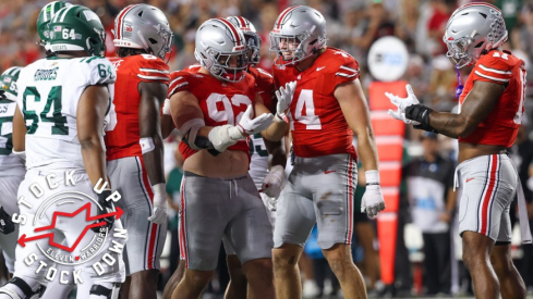 Caden Curry and C.J. Hicks celebrate