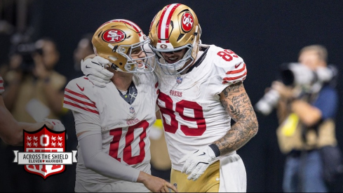 Luke Farrell celebrating his touchdown with Mac Jones