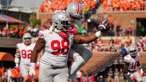 Kayden McDonald and Jermaine Mathews Jr. celebrate