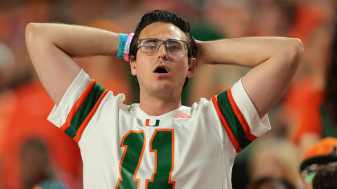 A Miami fan watches his No. 2 Hurricanes go down to Louisville