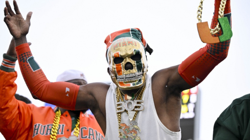 Miami Hurricanes fans cheer for Miami during the first quarter against the SMU