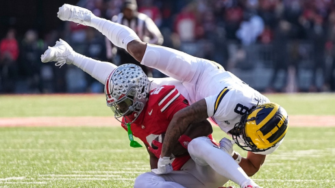 Caleb Downs intercepting a pass vs. Michigan in 2024