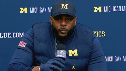 Michigan football coach Sherrone Moore speaks to the media following his team's 27-9 loss to Ohio State
