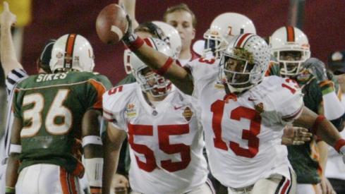 (FS FIESTA 3JAN03) 2003 Fiesta Bowl -- OSU vs. Miami -- Maurice Clarett celebrates after he pulled the ball from the hands of Sean Taylor at the National Football Championships at the Sun Devil Stadium in Tempe, Arizona, January 3, 2003. (Dispatch photo by Fred Squillante)