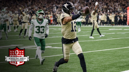 Chris Olave scoring a touchdown vs. the Jets