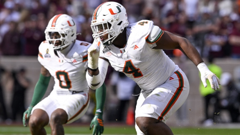 Rueben Bain Jr. (4) and Keionte Scott (0)