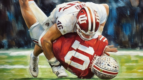 Indiana Hoosiers linebacker Isaiah Jones (46) hits Ohio State Buckeyes quarterback Julian Sayin (10) during the first half of the Big Ten Conference championship game at Lucas Oil Stadium in Indianapolis on Dec. 6, 2025.