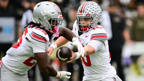 Julian Sayin hands the ball off to Bo Jackson