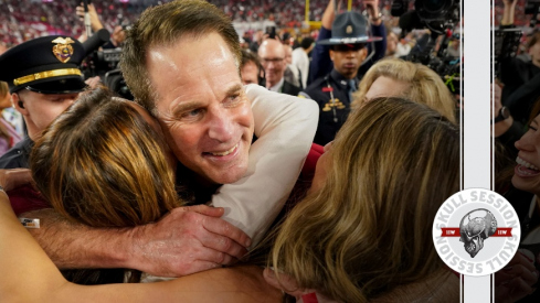Curt Cignetti hugs his family