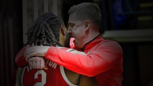 Jan 21, 2025; West Lafayette, Indiana, USA; Ohio State Buckeyes guard Bruce Thornton (2) shares a moment with Ohio State Buckeyes head coach Jake Diebler after defeating the Purdue Boilermakers at Mackey Arena. Mandatory Credit: Marc Lebryk-Imagn Images