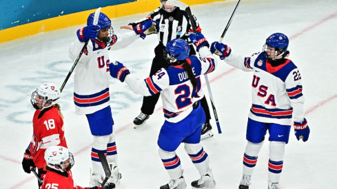 Joy Dunne celebrates with U.S. teammates
