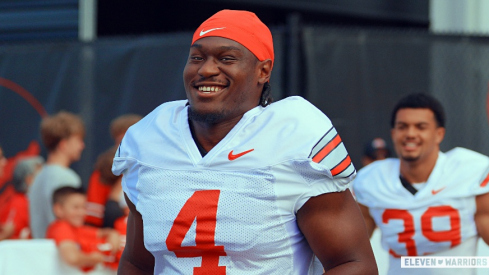 Ohio State defensive end Qua Russaw reacts after fans think he's Jeremiah Smith