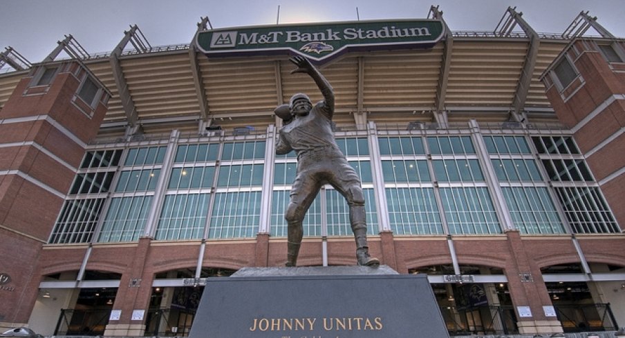 The original Johnny Football throws a pass outside a stadium he's never been in.