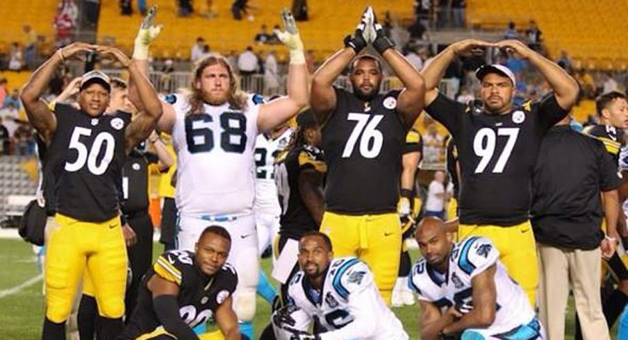 Ryan Shazier, Andrew Norwell, Mike Adams and Cam Heyward strike the O-H-I-O on Heniz Field.