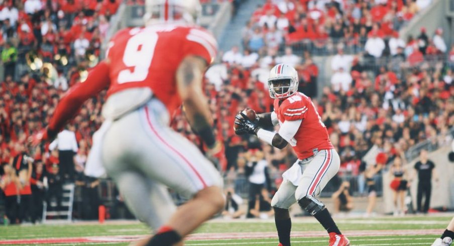 Four games into his collegiate career, J.T. Barrett is etching his name in the OSU record books.