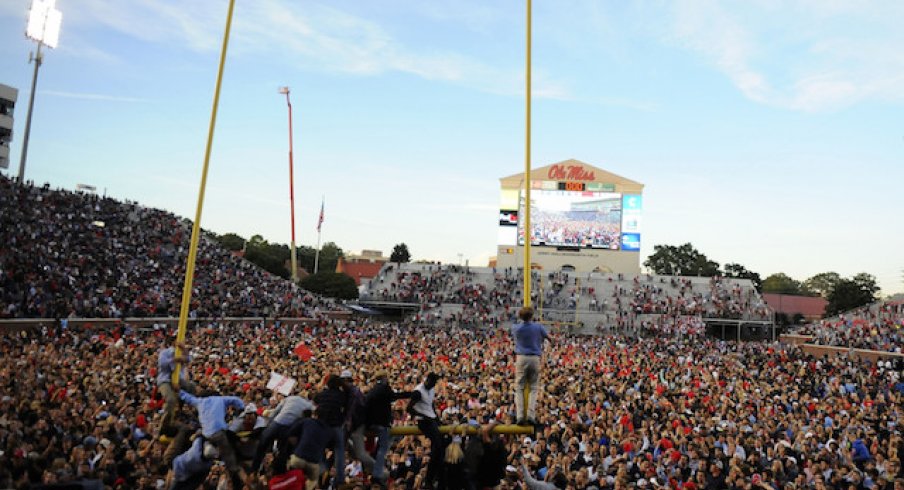 Ole Miss fans celebrate the upset of Alabama.