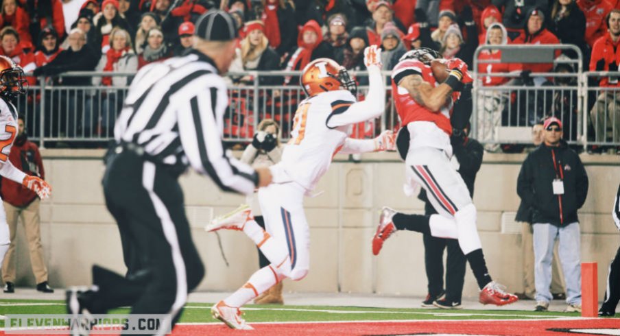 Devin Smith scores the first of his two touchdowns against Illinois.