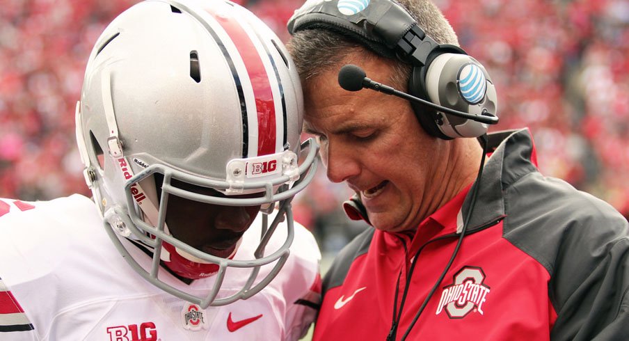 J.T. Barrett with Urban Meyer