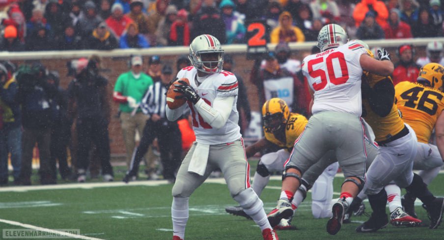 J.T. Barrett threw for 200 and nearly ran for another 200.