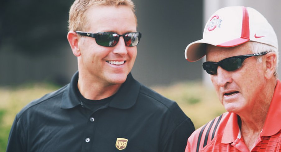 Kirk Herbstreit and John Cooper, trading jokes (no idea why Kirk is wearing a UPS shirt)