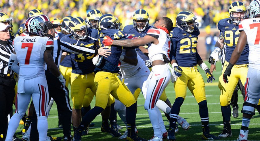 Ohio State and Michigan's annual clash is treated like war. So why are we so stunned when all that pent up aggression occasionally comes to blows? 
