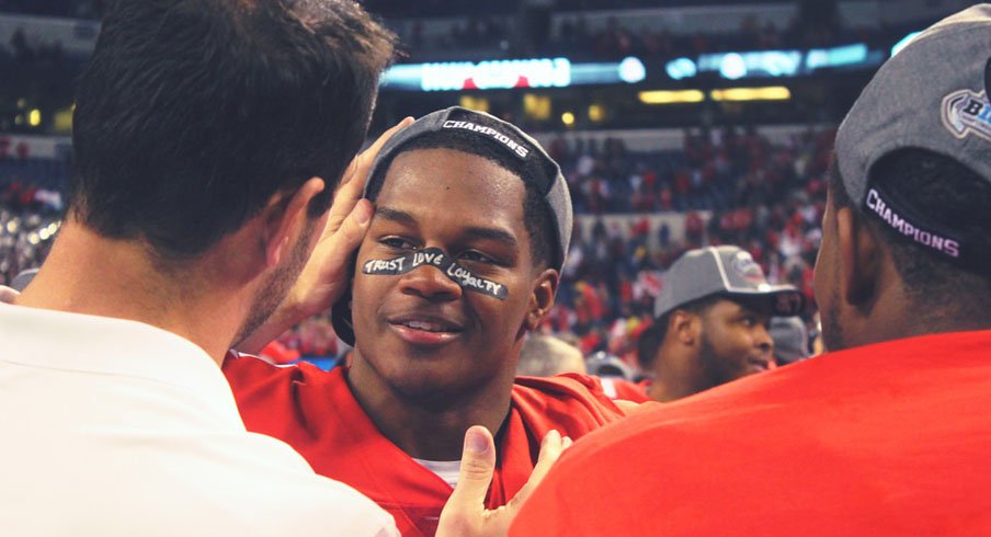 Luke Fickell and Raekwon McMillan celebrate a Big Ten Championship