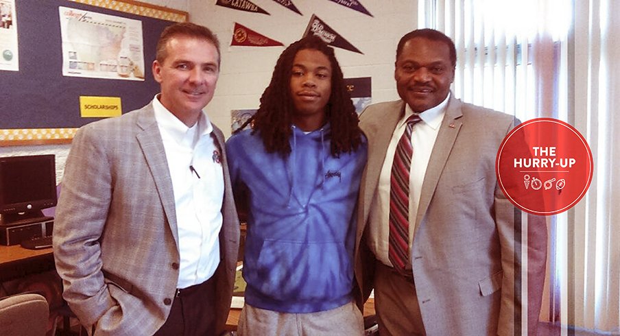 Urban Meyer, Juwuan Briscoe and Larry Johnson, Sr.