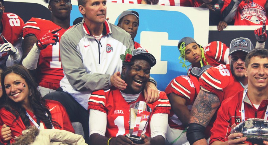 Urban Meyer and Cardale Jones share a moment.