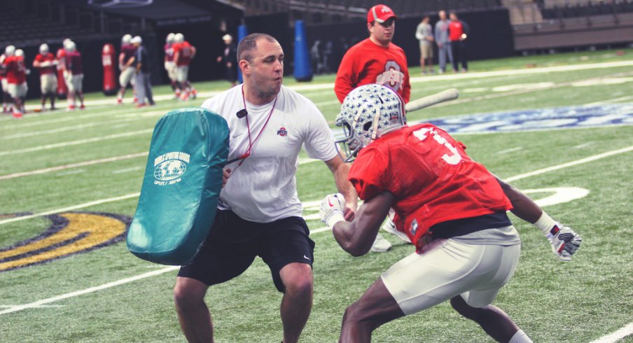 Michael Thomas runs through a drill.