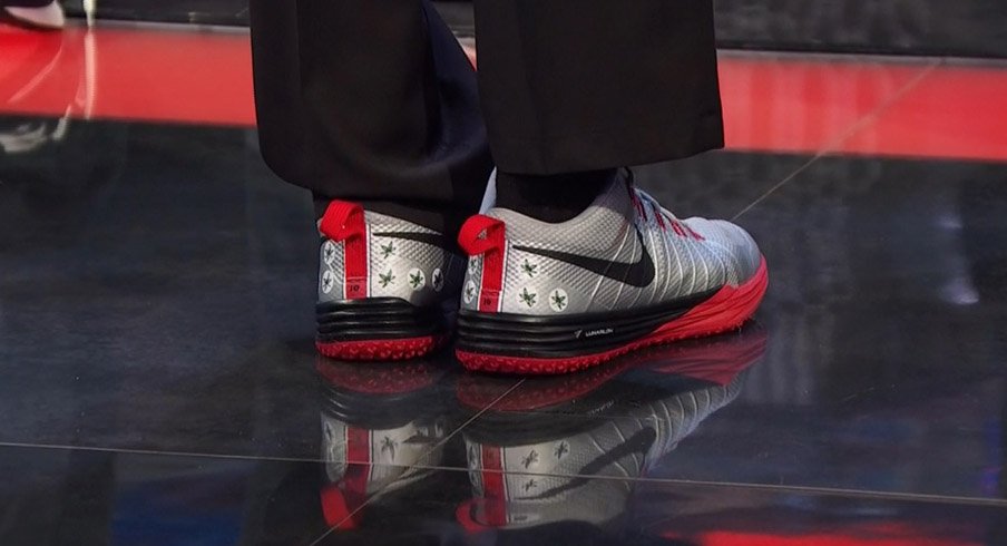 Cris Carter shows off his Ohio State Buckeyes Nike Lunar TR1s