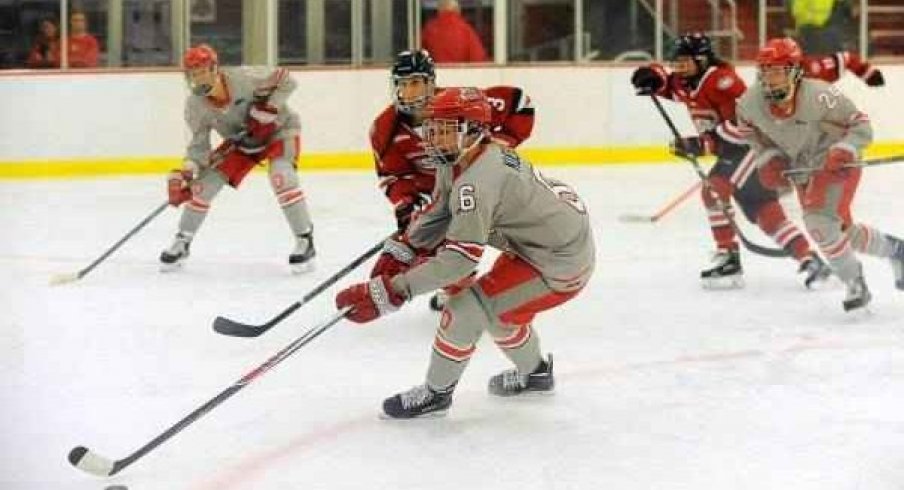 Taylor Kuehl with the puck on a string