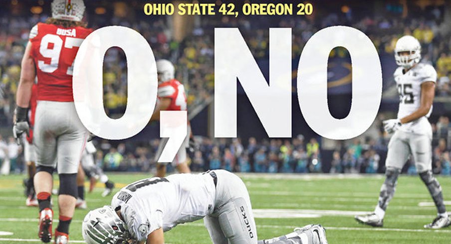 The cover of the Salem Statesman Journal with Marcus Mariota on the ground.