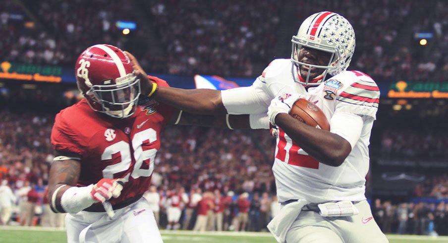 Cardale Jones administering the Stiff Arm of Justice to Alabama's Landon Collins
