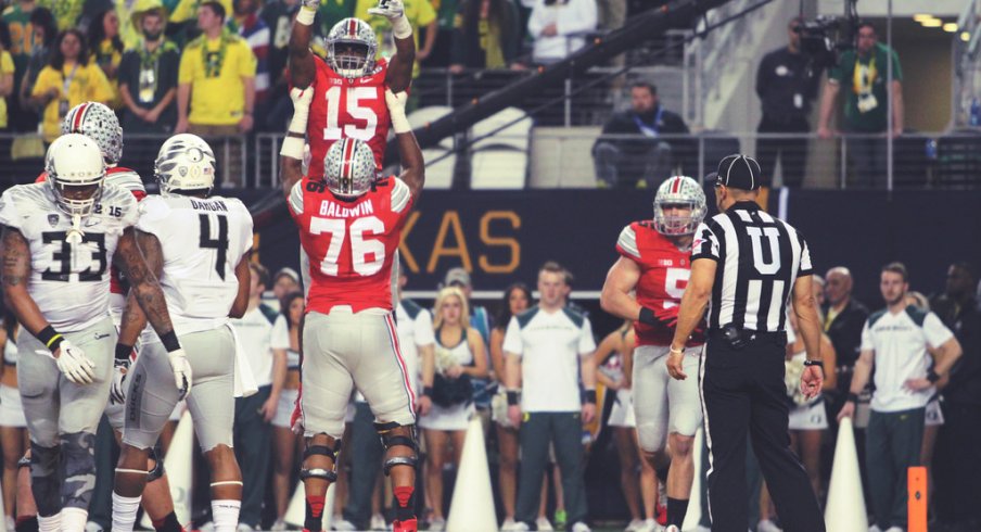 Ezekiel Elliott and Darryl Baldwin