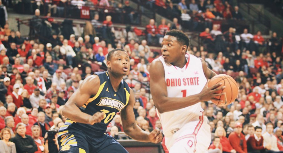 Jae'Sean Tate drives against Marquette.