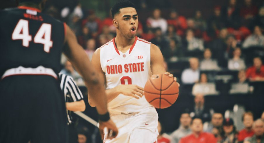 D'Angelo Russell dribbles the ball. 