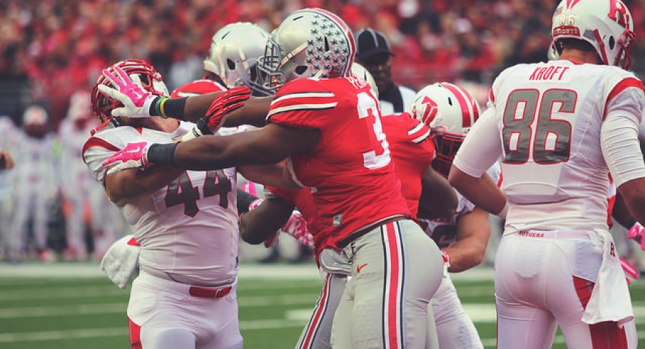 Joshua Perry gets in the face of a Rutgers defender. 