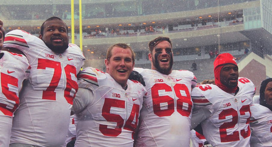 Ohio State's players celebrate a win in frigid Minnesota. 