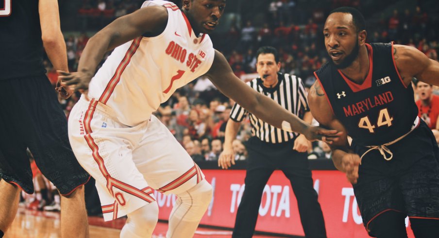 Jae'Sean Tate defends a drive.