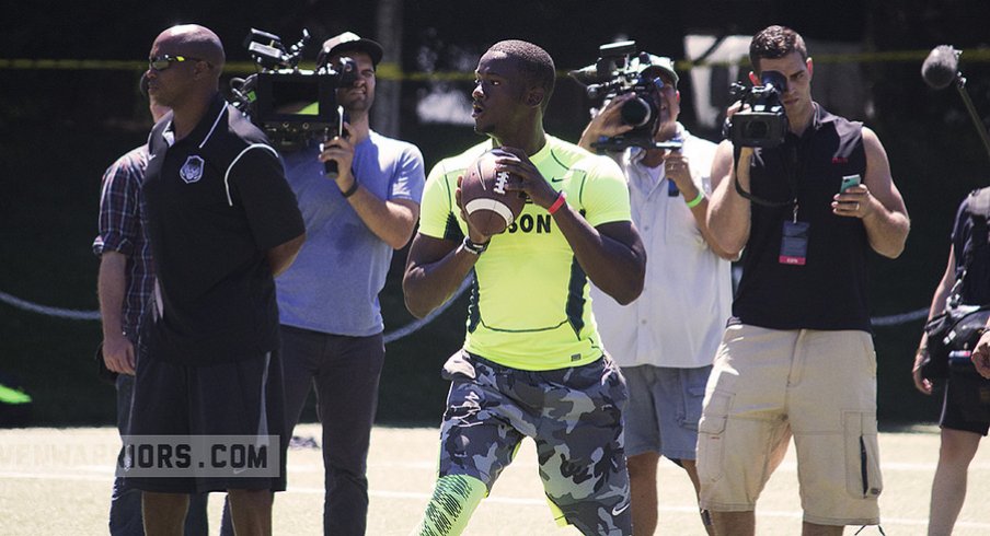 Torrance Gibson throws a pass.