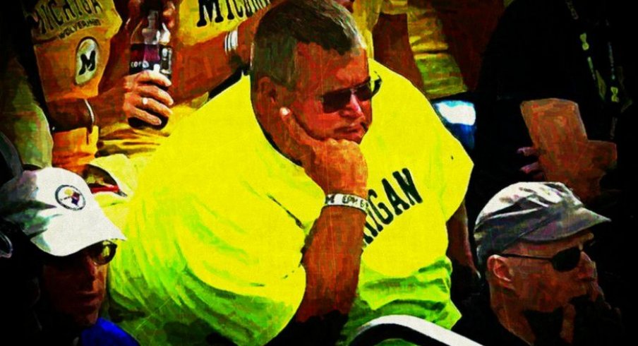 Michigan fans watching the Little Brown Jug slip away, 2014